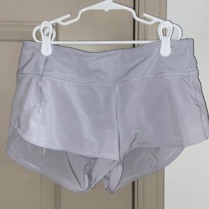 Grey Lululemon speed up shorts. In great condition! Size 4, 2.5 inches.